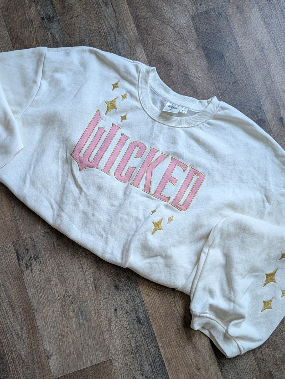 Wicked Movie Embroidered Sweatshirt LG Cream Pink Gold Stars Universal Merch